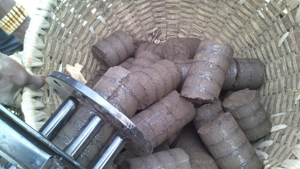 Finished briquettes exiting the cooling line