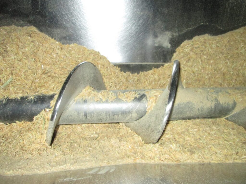 Raw material in feeding screw